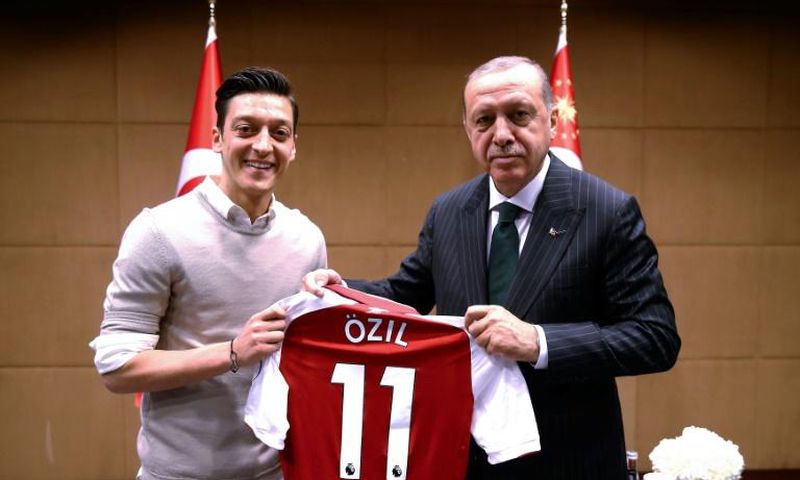 This photograph of Mesut Ozil meeting Turkish President Recep Tayyip Erdogan in May 2018 sparked a storm of criticism in Germany