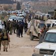 Turkey-backed-opposition fighters regroup as they advance on the western outskirts of the northern Syrian city of al-Bab in a bid to enter the city and retake control of it from the Islamic State (IS) group on February 9, 2017