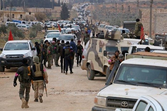 Turkey-backed-opposition fighters regroup as they advance on the western outskirts of the northern Syrian city of al-Bab in a bid to enter the city and retake control of it from the Islamic State (IS) group on February 9, 2017