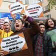 Participants hold placards reading, "Free press can't be silenced" (C) outside the office of Turkish newspaper Cumhuriyet in Ankara in 2016