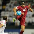 Qatar's Sebastian Soria (R) controls the ball ahead of Syria's Mahmoud al-Mawas during the 2018 World Cup qualifying football match between Qatar and Syria at the Jassim Bin Hamad Stadium in Doha on October 11, 2016