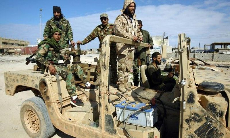 Members of the Libyan National Army (LNA), also known as the forces loyal to Marshal Khalifa Haftar, patrol the area of Qanfudah, on the southern outskirts of Benghazi