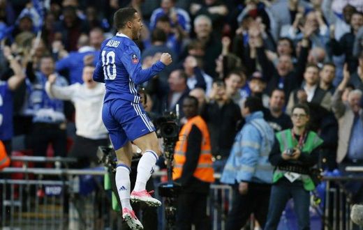 Eden Hazard celebrates scoring Chelsea's third goal during their FA Cup semi-final football match against Tottenham Hotspur at Wembley stadium in London on April 22, 2017