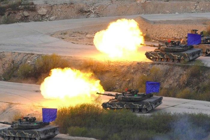 South Korean K1A2 tanks fire live rounds during a joint live firing drill between South Korea and the US at the Seungjin Fire Training Field in Pocheon on April 26, 2017
