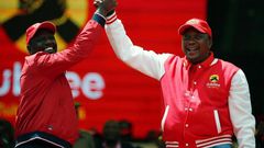 President Uhuru Kenyatta and Deputy President William Ruto during the launch of the Jubilee Party at Safaricom Stadium in Nairobi on Septermber 10, 2016.