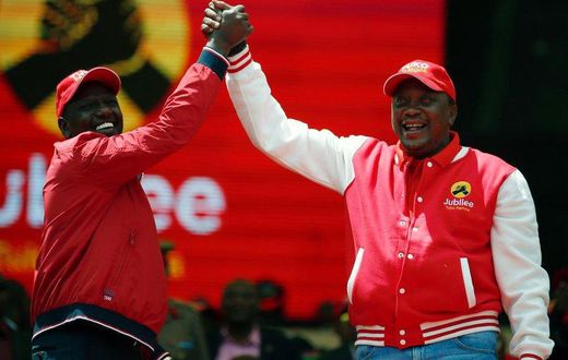 President Uhuru Kenyatta and Deputy President William Ruto during the launch of the Jubilee Party at Safaricom Stadium in Nairobi on Septermber 10, 2016.