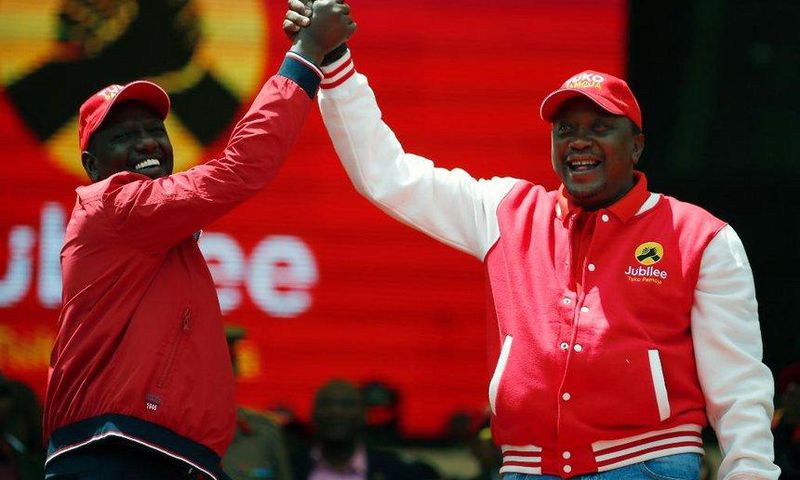 President Uhuru Kenyatta and Deputy President William Ruto during the launch of the Jubilee Party at Safaricom Stadium in Nairobi on Septermber 10, 2016.