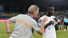 Ivory Coast's coach Michel Dussuyer (L) speaks to defender Eric Bailly ahead of the team's Africa Cup of Nations match against Morocco on January 24, 2017