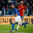 Italy's midfielder Daniele De Rossi celebrates after scoring a penalty on October 6, 2016