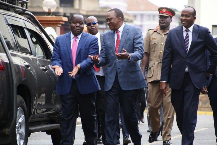 Interior cabinet secretary Fred Matiang'i, President Uhuru Kenyatta and Garissa Town MP Aden Duale