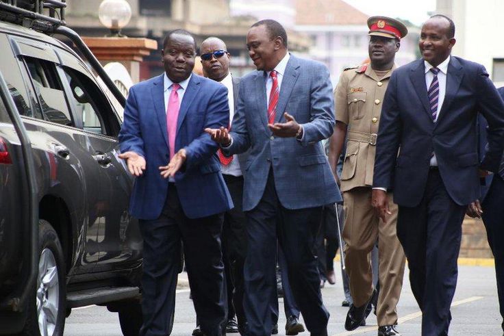 Interior cabinet secretary Fred Matiang'i, President Uhuru Kenyatta and Garissa Town MP Aden Duale