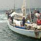 Philippine navy personnel stand onboard the yatch Rockall, where the body of a naked white woman who had been shot was found was aboard, after it was recovered off Laparan island, in Sulu province