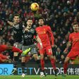 Liverpool's English striker Daniel Sturridge (L) shoots but fails to score during the EFL Cup semi-final second-leg football match against Southampton January 25, 2017