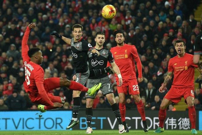 Liverpool's English striker Daniel Sturridge (L) shoots but fails to score during the EFL Cup semi-final second-leg football match against Southampton January 25, 2017