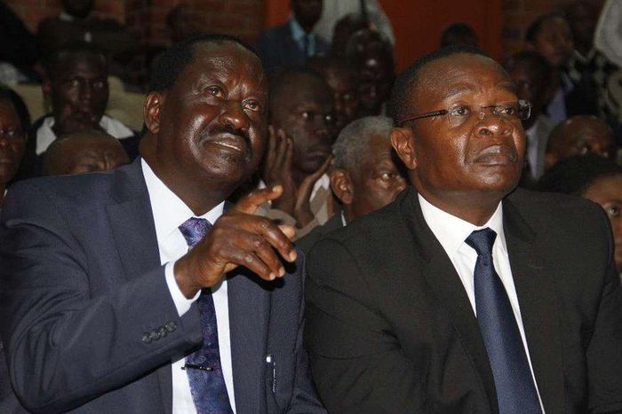 ODM leader Raila Odinga with Funyula MP Paul Otuoma.