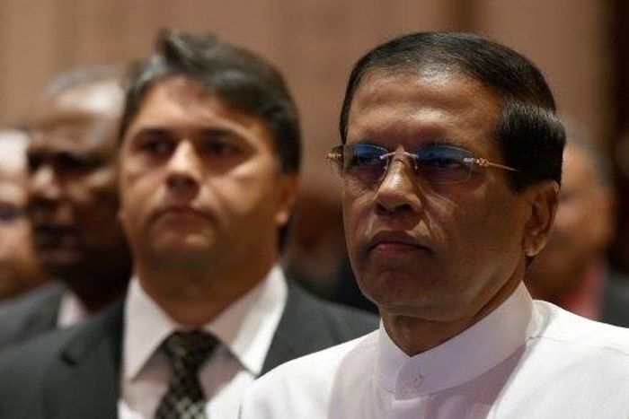 Sri Lanka's President Maithripala Sirisena (right) pictured in Colombo on December 19, 2016