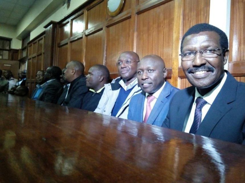 File image of former KPLC boss Ben Chumo with others in court on over corruption