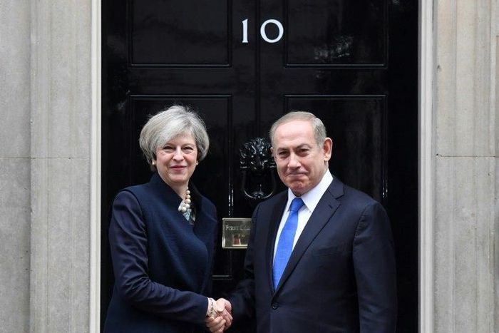 British Prime Minister Theresa May (left) shakes hands with Israeli Prime Minister Benjamin Netanyahu at 10 Downing Street in London on February 6, 2017