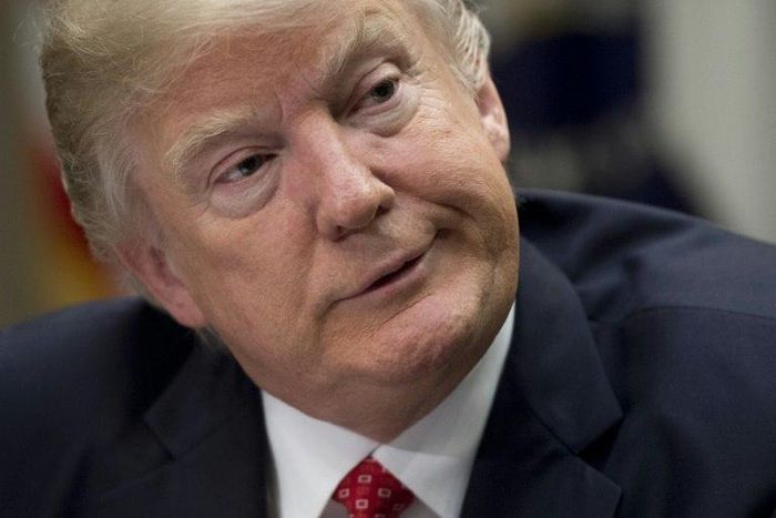 US President Donald Trump speaks during a meeting with county sheriffs in the Roosevelt Room of the White House in Washington, DC, February 7, 2017