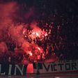 Besiktas supporters burn flares during the UEFA Europa League first leg quarter final football match against Lyon April 13, 2017, at the Parc Olympique Lyonnais stadium in Decines-Charpieu