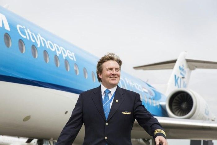 Dutch King Willem-Alexander posing in front of a KLM Cityhopper aircraft at Schiphol Airport, near Amsterdam on May 16, 2017