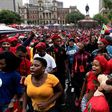 Opposition activists gather in Pretoria, on April 12, 2017 ahead of a march calling for the ousting of South Africa's embattled President Jacob Zuma