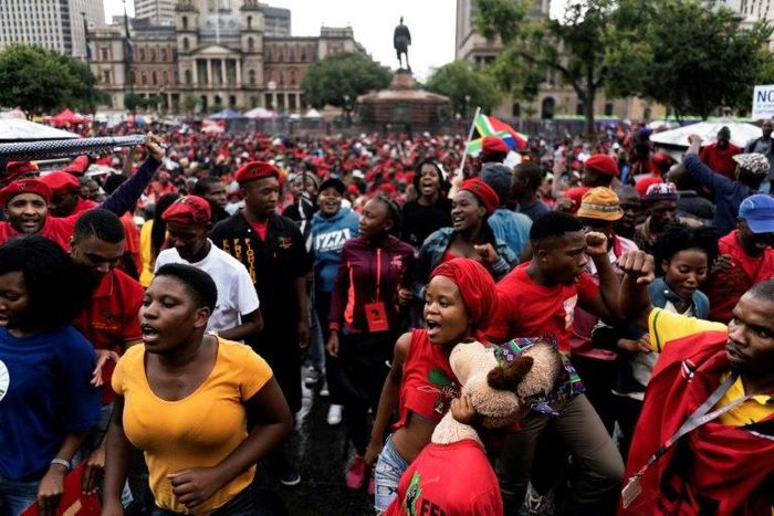 Opposition activists gather in Pretoria, on April 12, 2017 ahead of a march calling for the ousting of South Africa's embattled President Jacob Zuma