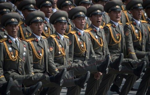 Ggoose-stepping soldiers pour into Kim Il-Sung Square, in Pyongyang on April 15, 2017
