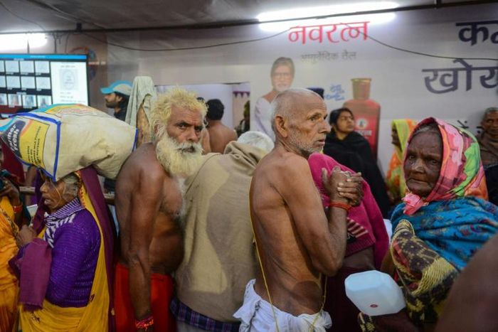 Indian pilgrims seek out the computerized lost and found centres after they lose their relatives in the vast crowds at the Kumbh Mela festival in Allahabad