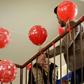 A member from the "Rebirth Generation", a group of Iraqi youths who are trying to revive the embattled city of Mosul, distributes balloons as they organise an event to mark Valentine's Day on February 14, 2017