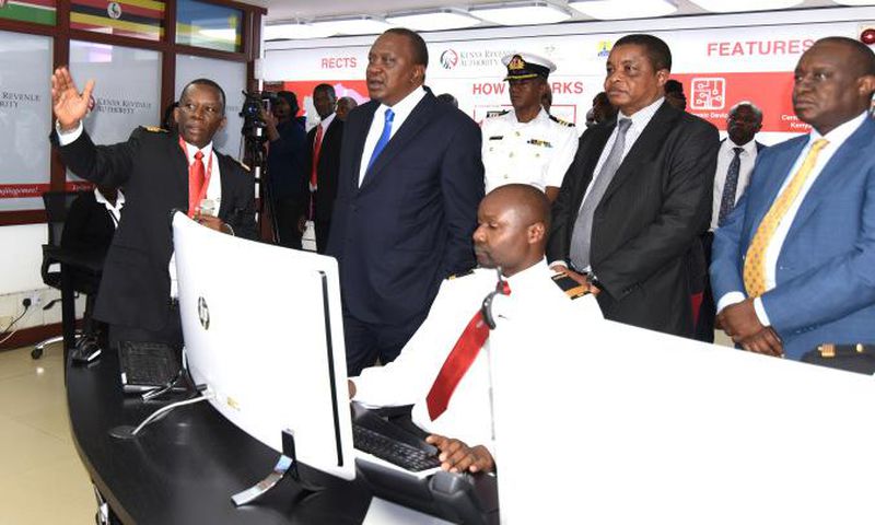 President Uhuru Kenyatta being briefed at KRA