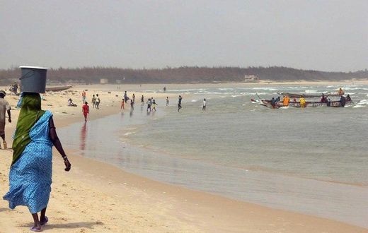 Senegalese fishermen return to the coastal town of Kayar in 2005
