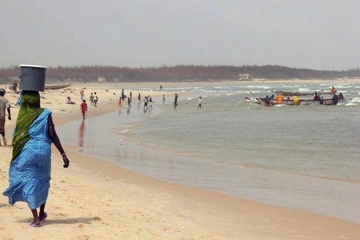 Senegalese fishermen return to the coastal town of Kayar in 2005