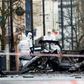 Two men in their twenties were arrested as police and army explosives teams remained at the scene of the blast