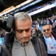 Manchester United's Jose Mourinho gets close to a camera during their match against Manchester City at the Etihad Stadium in Manchester, north west England, on April 27, 2017