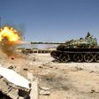 Members of the Libyan National Army (LNA), which is loyal to strongman Khalifa Haftar, fire a tank during fighting against jihadists in Benghazi on May 20, 2017