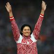 Russia's gold medalist Tatyana Lysenko poses on the podium of the women's hammer throw at the athletics event held at the Olympic Stadium during the London 2012 Olympic Games on August 11, 2012 in London