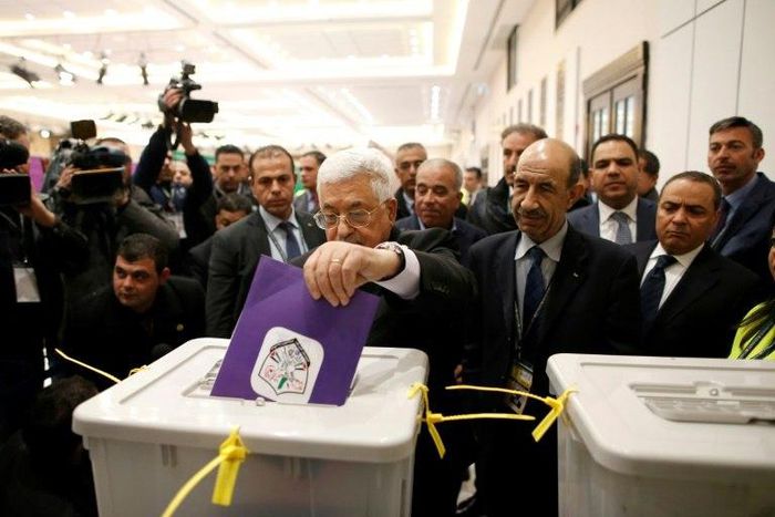 Palestinian president Mahmud Abbas casts his vote in internal Fatah party elections at the Muqataa, the Palestinian Authority headquarters, in Ramallah in December 2016