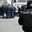 Ukrainian police inspect the body of Denis Voronenkov after the former Russian lawmaker was shot dead in Kiev, on March 23, 2017
