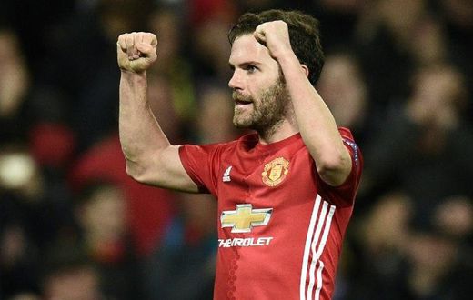 Manchester United's midfielder Juan Mata celebrates scoring the opening goal during the UEFA Europa League round of 16 second-leg football match against Rostov March 16, 2017