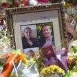 Photos showing Katrina Dawson (L) and Tori Johnson (R) sit amongst the floral tributes left outside the Lindt cafe in Sydney's Martin Place, one week after a deadly siege in December 2014