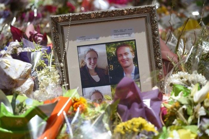 Photos showing Katrina Dawson (L) and Tori Johnson (R) sit amongst the floral tributes left outside the Lindt cafe in Sydney's Martin Place, one week after a deadly siege in December 2014