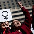 Activists protest the Trump administration and rally for women's rights during a march to honor International Woman's Day on March 8, 2017 in Washington, DC