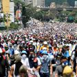Oppositon activists march along Francisco Fajardo highway, during a protest against President Nicolas Maduro in Caracas, on May 10, 2017