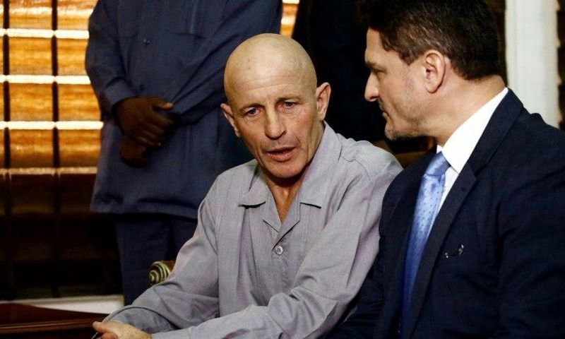 Frenchman Thierry Frezier who was kidnapped in Chad on March 23 speaks with French charge d'affaires in Khartoum Christian Bec on May 7, 2017, after being freed