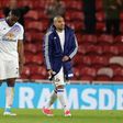Sunderland's striker Victor Anichebe (L) and Sunderland's midfielder Wahbi Khazri walk from the picth after the English Premier League football match against Middlesbrough April 26, 2017