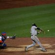 Conor Gillaspie of the San Francisco Giants hits a three-run home run in the ninth inning against the New York Mets on October 5, 2016