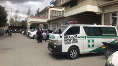 An ambulance parked outside the entrance to Shalom Hospital Athi River
