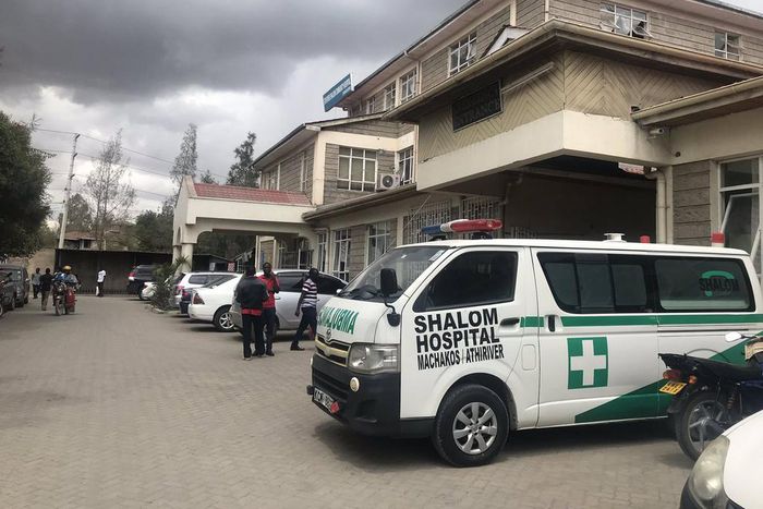 An ambulance parked outside the entrance to Shalom Hospital Athi River