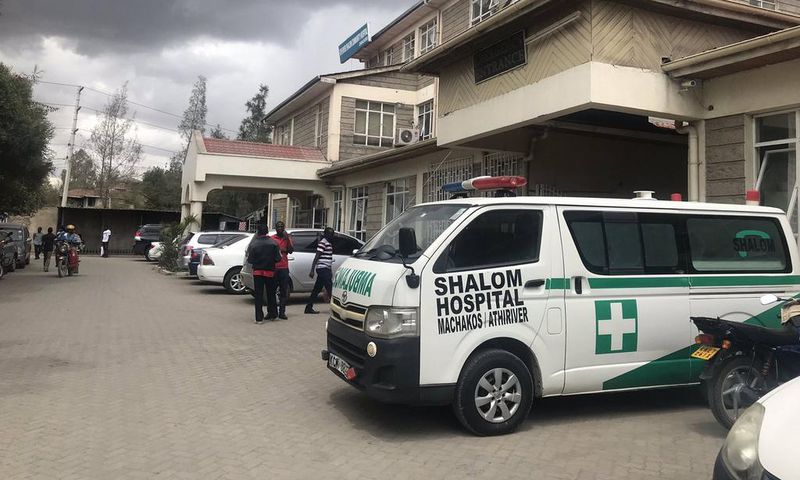 An ambulance parked outside the entrance to Shalom Hospital Athi River